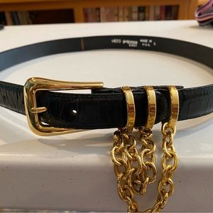 MotionEast black belt with gold buckle and chain
